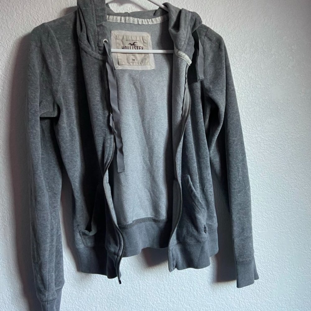 grey zip up sweatshirt